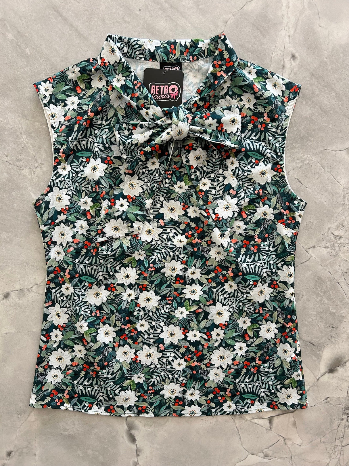 Top con lazo floral de invierno