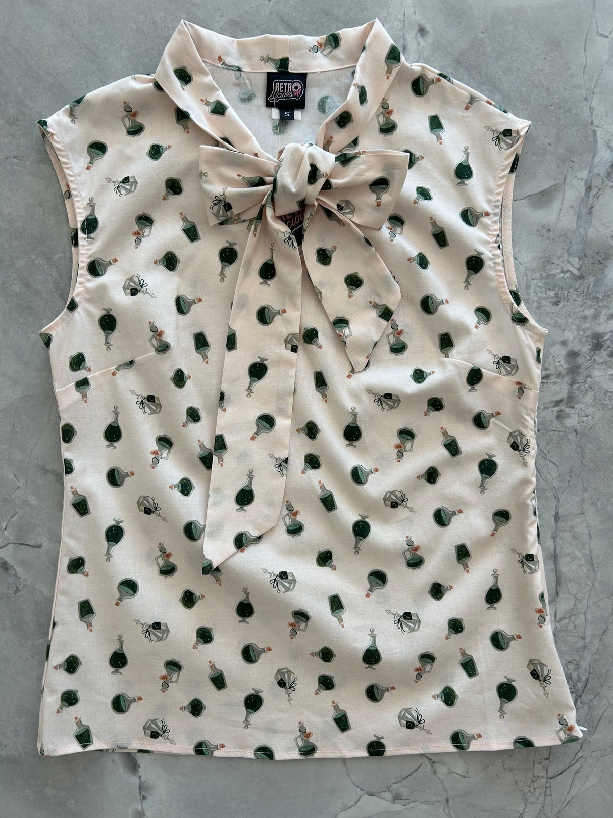 Top de lazo de pociones