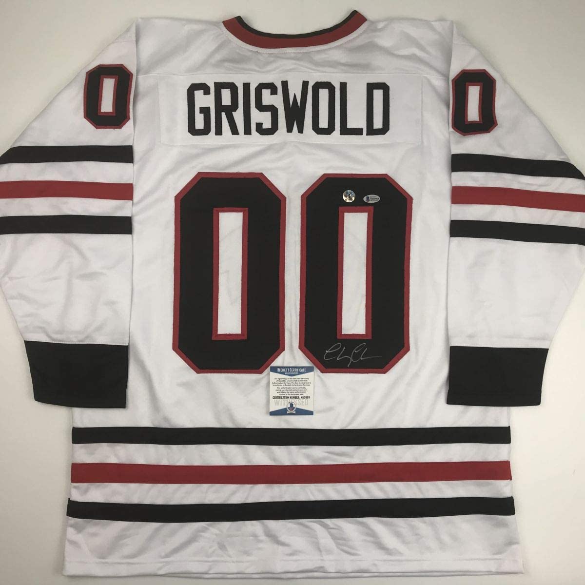 Camiseta de hockey blanca de Chicago de la película de vacaciones navideñas de Clark Griswold, autografiada/firmada por Chevy Chase Beckett BAS COA
