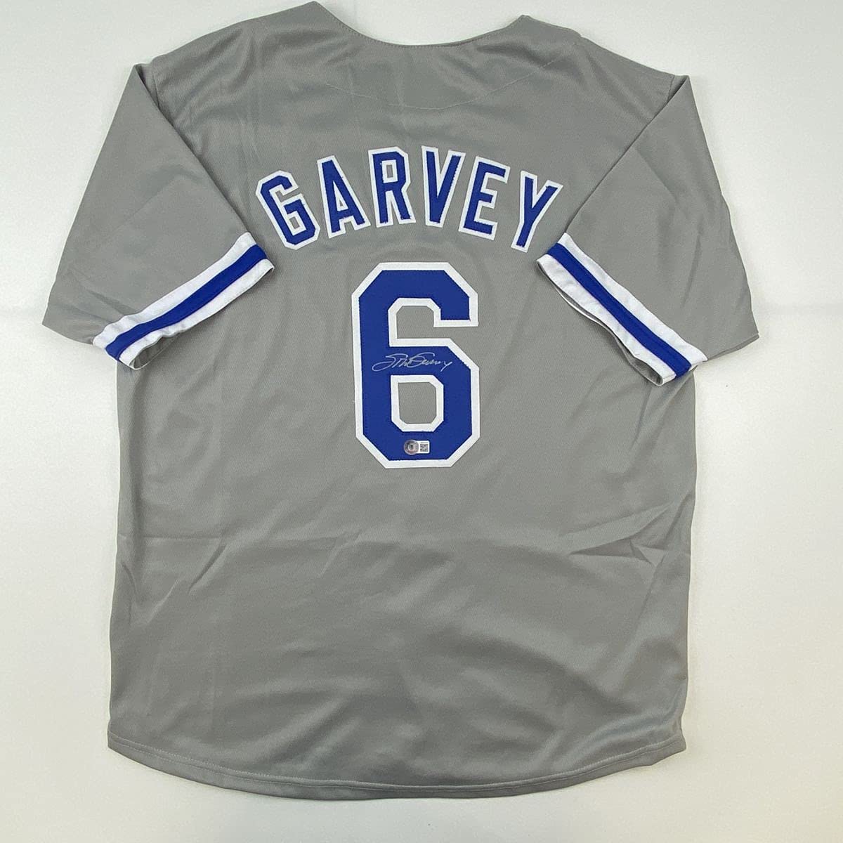 Camiseta de béisbol gris autografiada/firmada de Steve Garvey Los Ángeles LA Beckett BAS COA