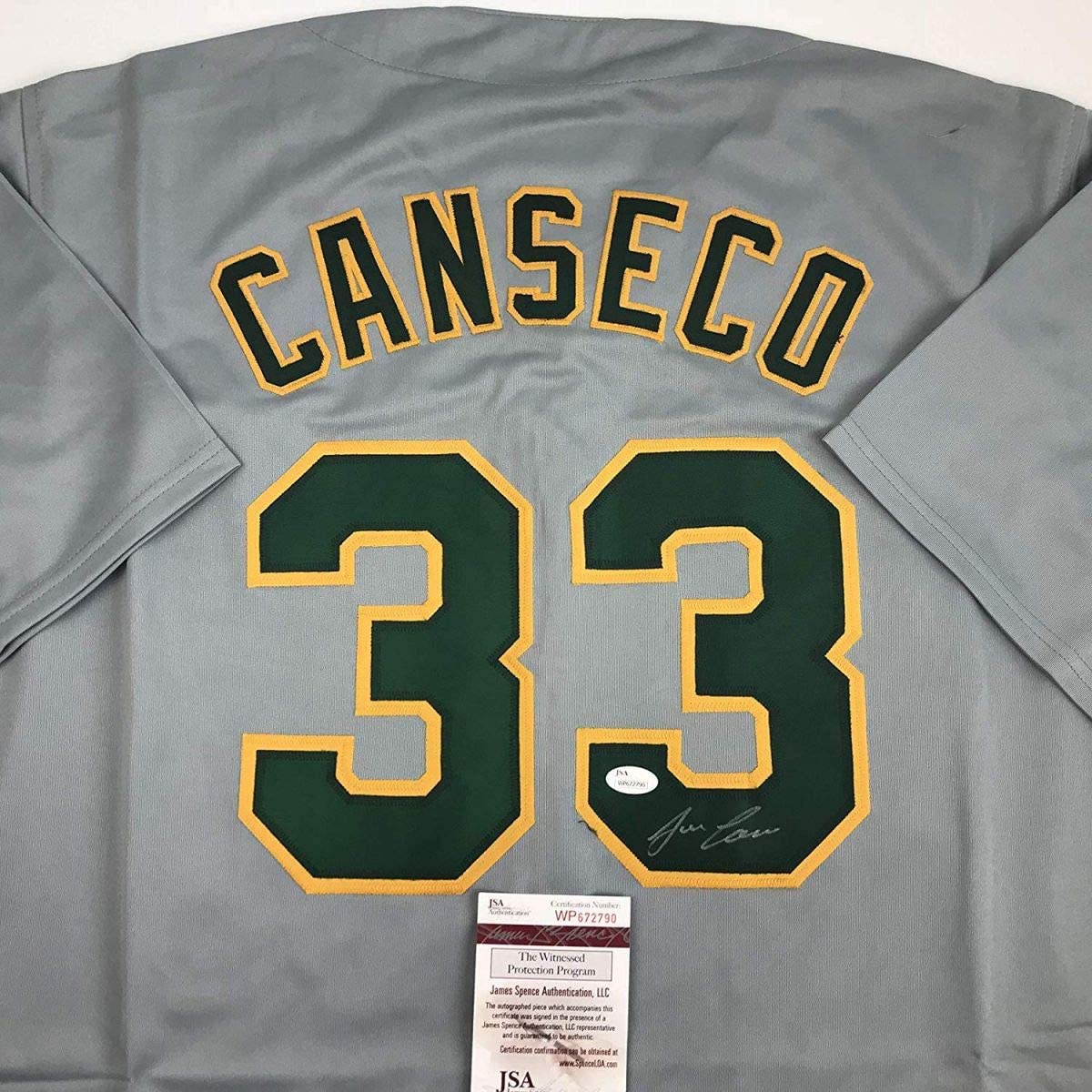 Autographed/Signed Jose Canseco Oakland Grey Baseball Jersey JSA COA