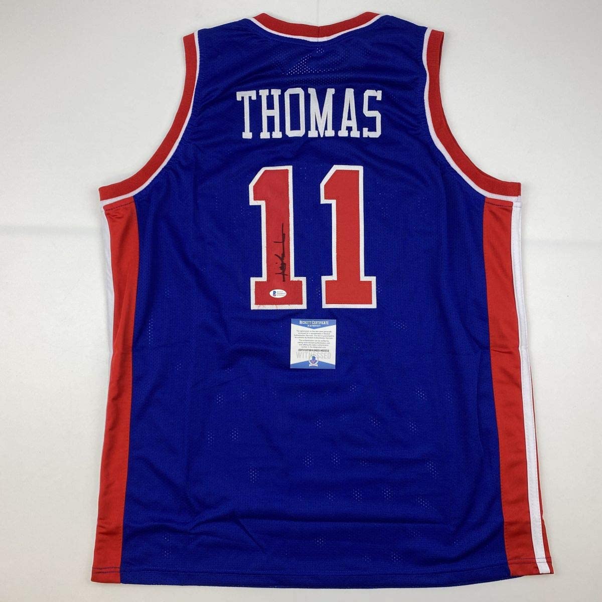 Camiseta de baloncesto azul de Detroit de Isiah Thomas autografiada/firmada Beckett BAS COA