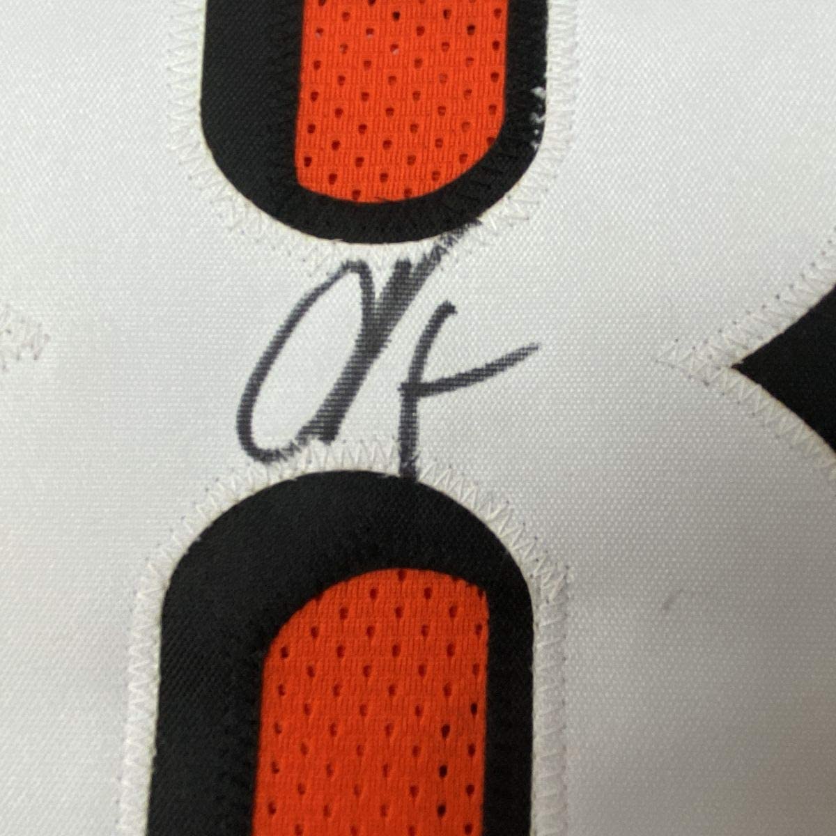 Camiseta de fútbol naranja de Cincinnati autografiada/firmada por Chad Johnson Ochocinco (JSA COA)