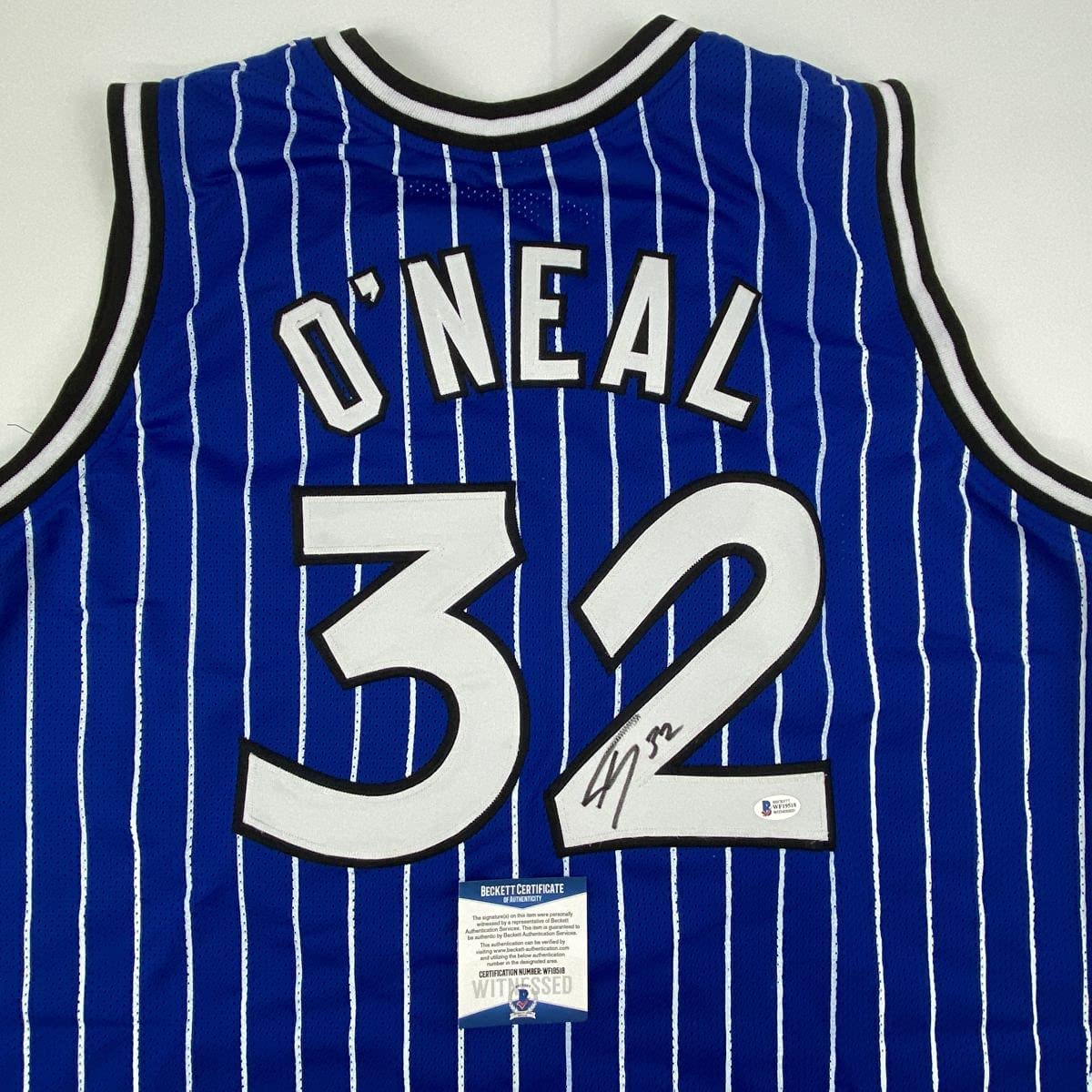 Autographed/Signed Shaquille Shaq O'Neal Orlando Blue Pinstripe Basketball Jersey Beckett BAS COA