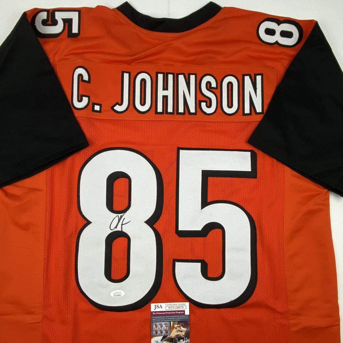 Camiseta de fútbol naranja de Cincinnati autografiada/firmada por Chad Johnson Ochocinco (JSA COA)