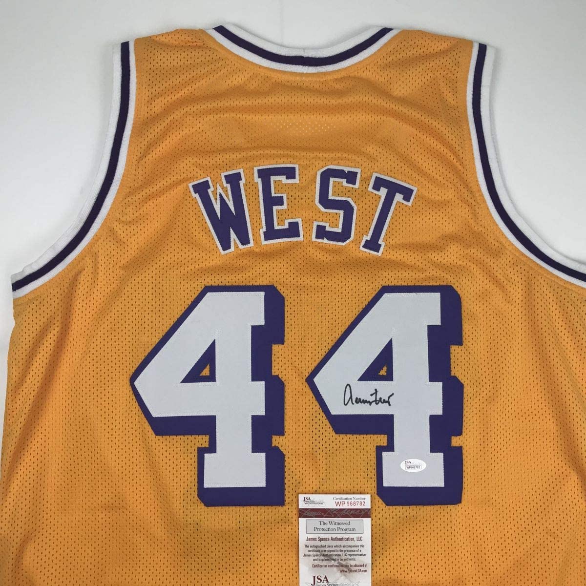 Camiseta de baloncesto amarilla de Los Ángeles LA autografiada/firmada de Jerry West JSA COA