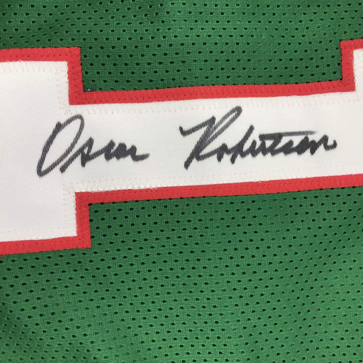 Camiseta de baloncesto verde de Milwaukee autografiada/firmada por Oscar Robertson. PSA/Certificado de ADN.