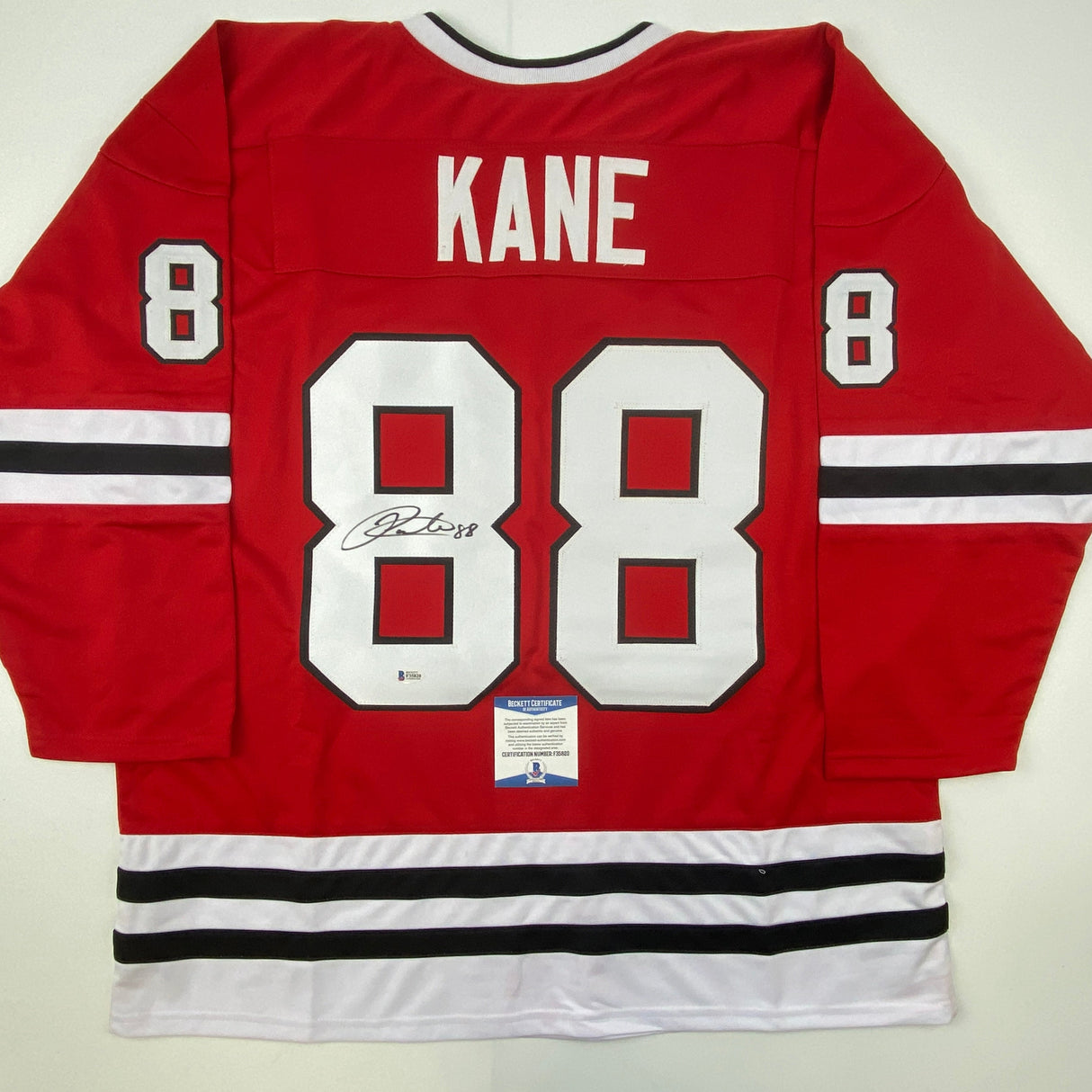 Camiseta de hockey roja de Chicago autografiada/firmada por Patrick Kane Beckett BAS COA