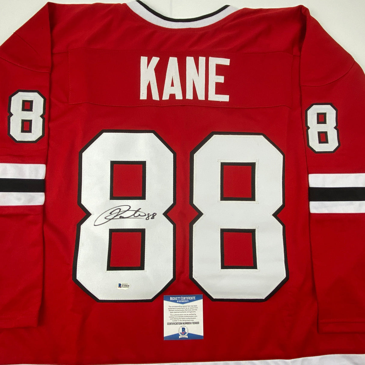 Camiseta de hockey roja de Chicago autografiada/firmada por Patrick Kane Beckett BAS COA