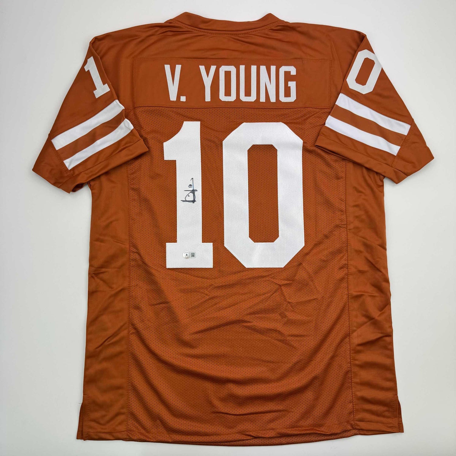 Camiseta de fútbol americano universitario Texas Orange autografiada/firmada por Vince Young Beckett BAS COA