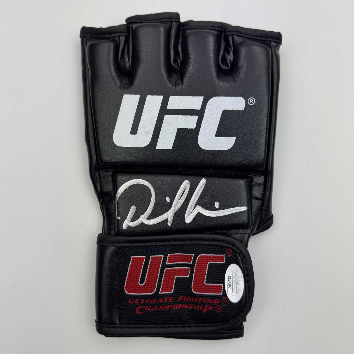 Autographed/Signed Daniel Cormier UFC MMA Black Fighting Glove JSA COA Auto
