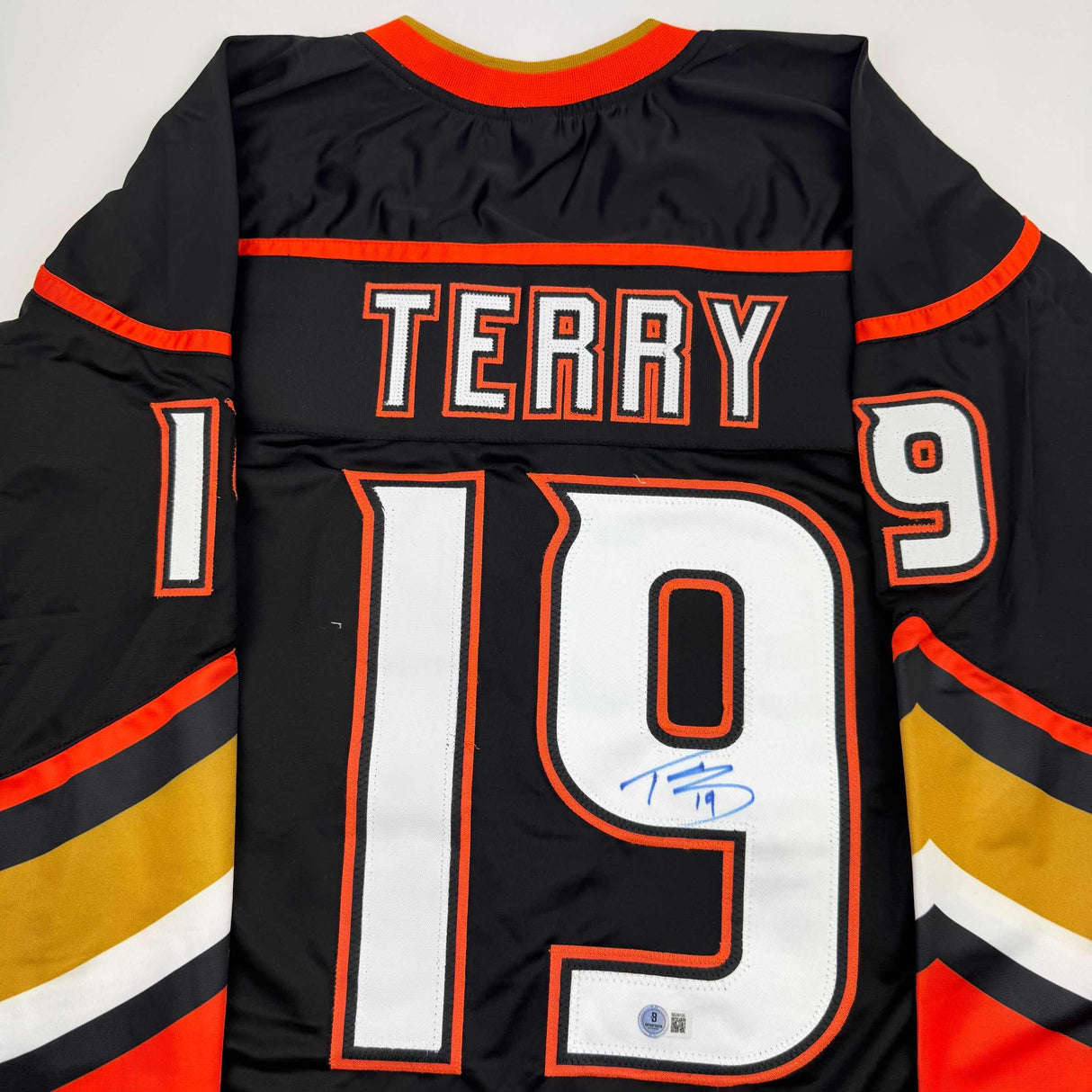 Autographed/Signed Troy Terry Anaheim Black Hockey Jersey Beckett BAS COA
