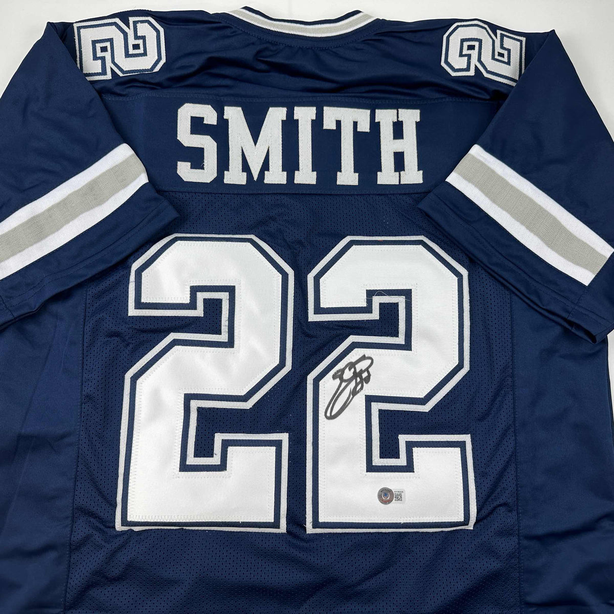 Camiseta de fútbol azul de Dallas de Emmitt Smith autografiada/firmada Beckett BAS COA