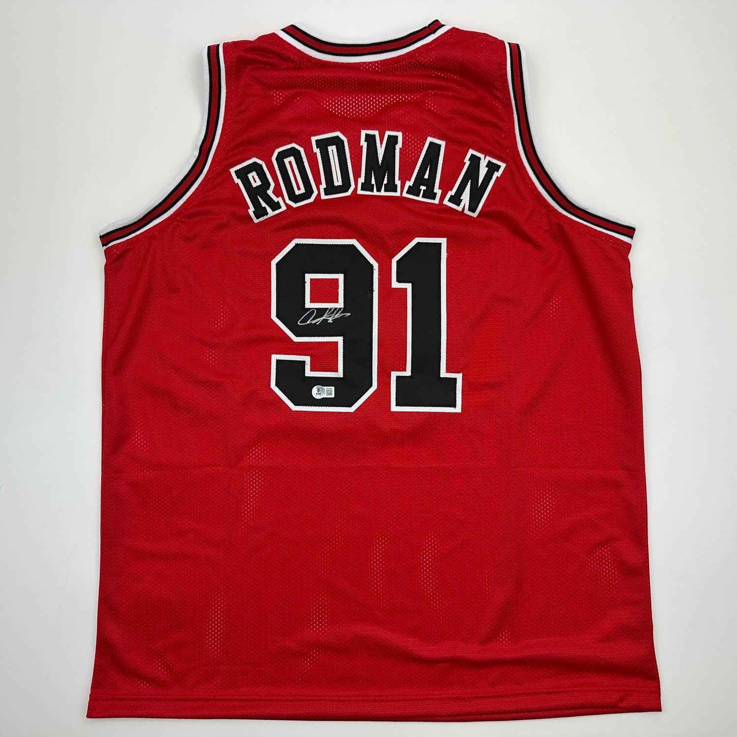 Camiseta de baloncesto roja de Chicago de Dennis Rodman autografiada/firmada Beckett BAS COA