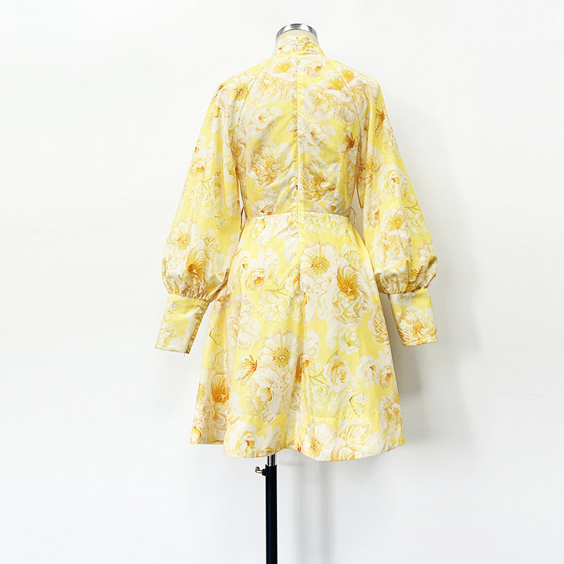 Vestido festivo con mangas farol y cinturón