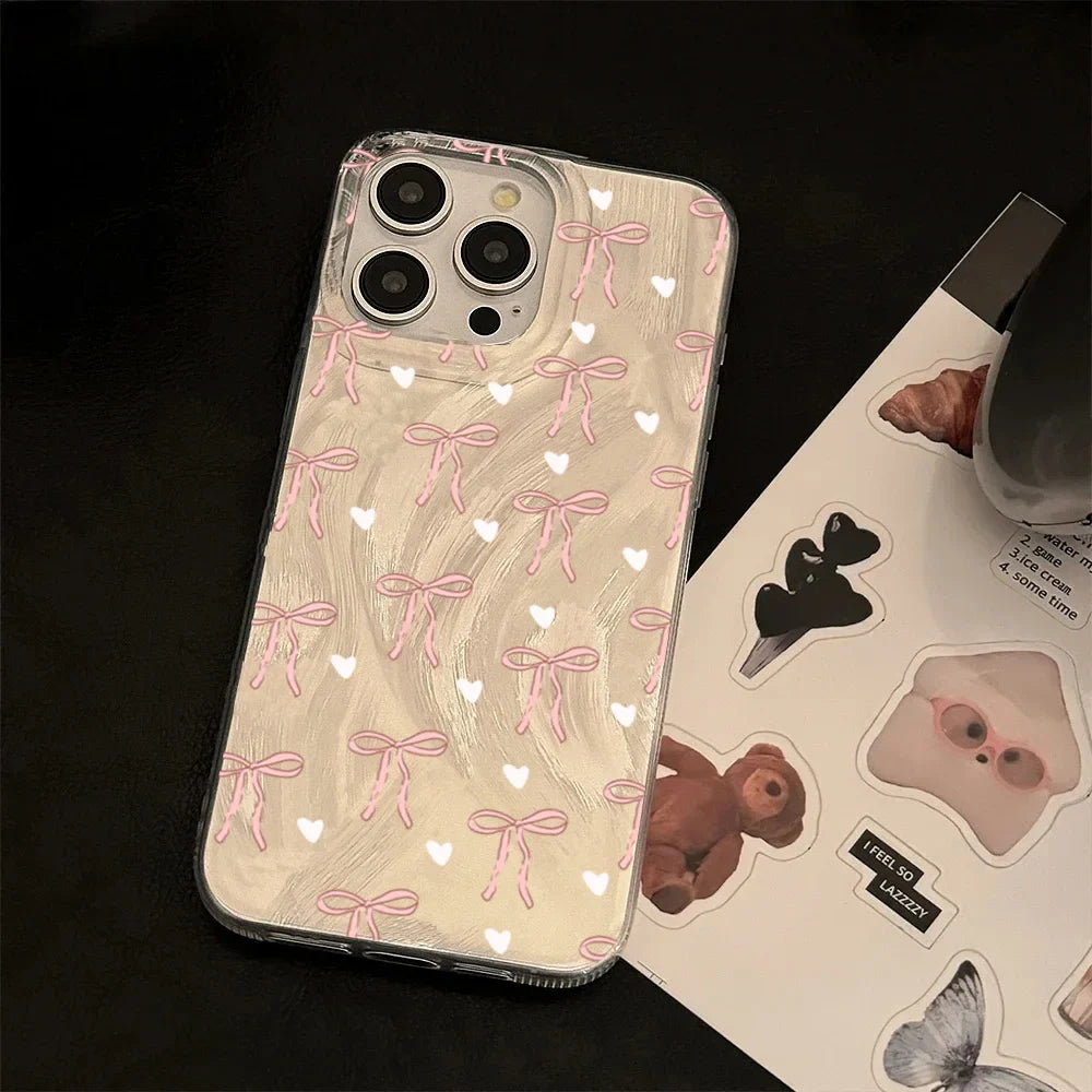 Funda para teléfono con lazo rosa y corazón blanco