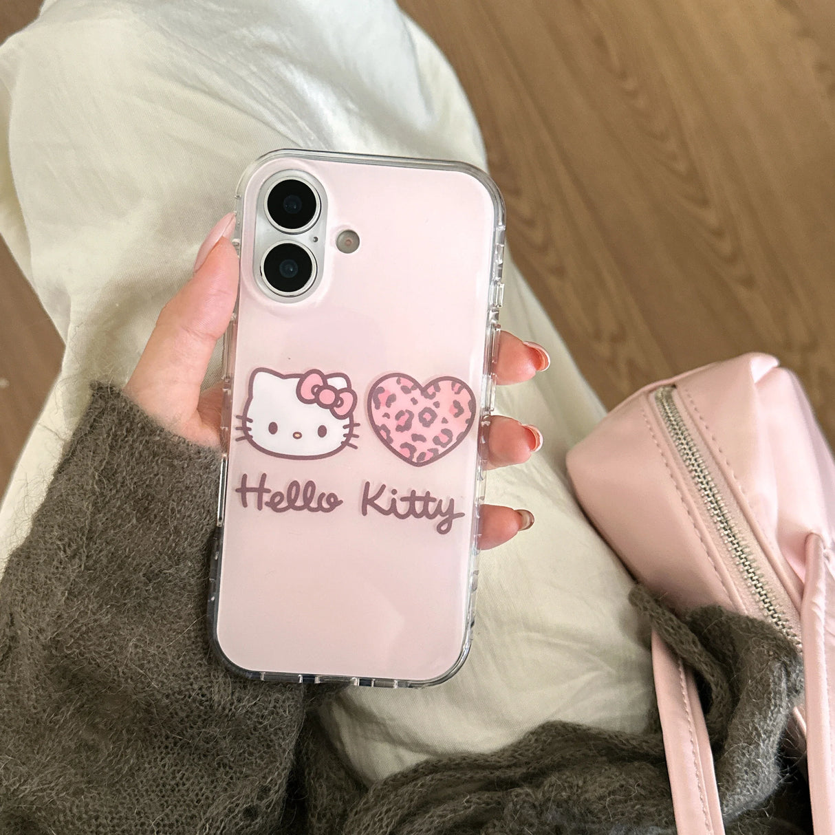 Bonita funda para iPhone con estampado de leopardo rosa de Hello Kitty de IMD.