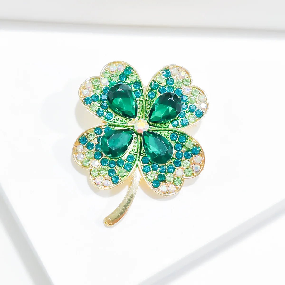 Cross border popular imitation emerald rhinestone four leaf clover brooch chest flower retro brooch - Lootquake