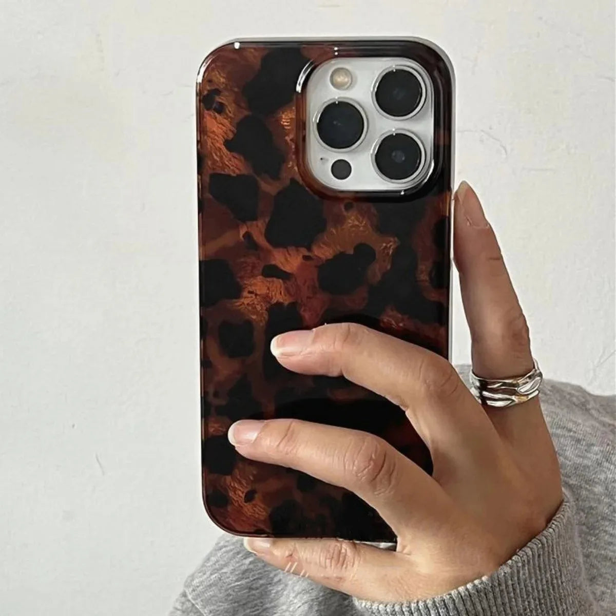 Funda retro con textura ámbar y láser para iPhone