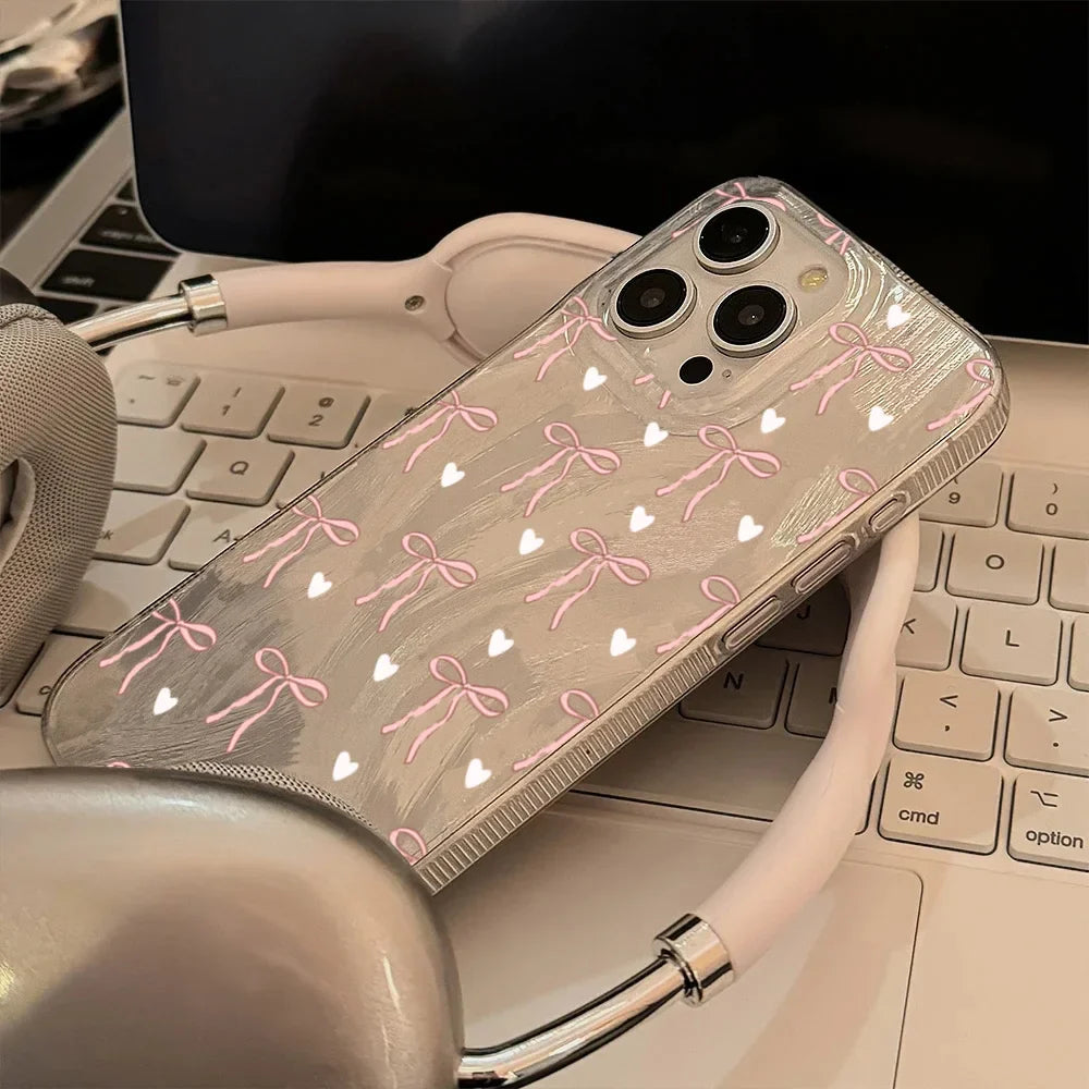 Funda para teléfono con lazo rosa y corazón blanco