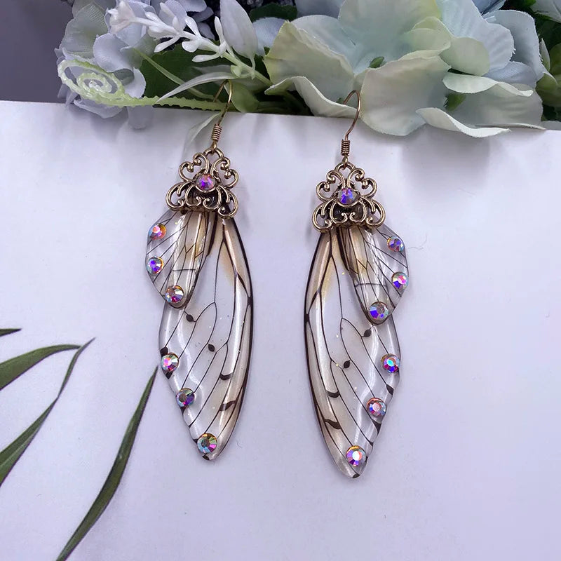 Boucles d'oreilles en forme d'ailes de fée faites à la main, en forme d'ailes de papillon, d'insectes, en forme de goutte, en feuille de strass, bijoux de mariée romantiques