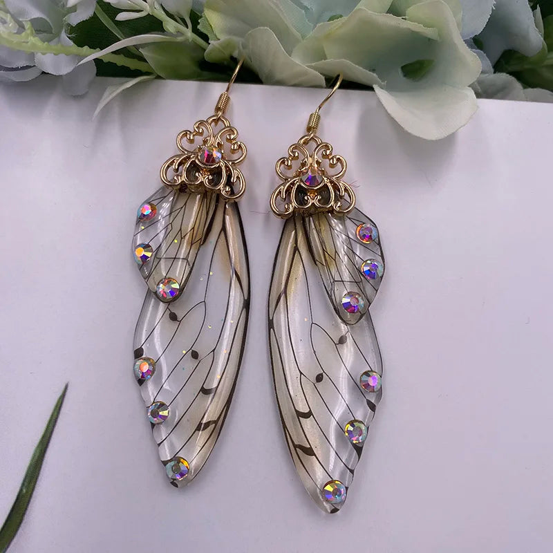 Boucles d'oreilles en forme d'ailes de fée faites à la main, en forme d'ailes de papillon, d'insectes, en forme de goutte, en feuille de strass, bijoux de mariée romantiques