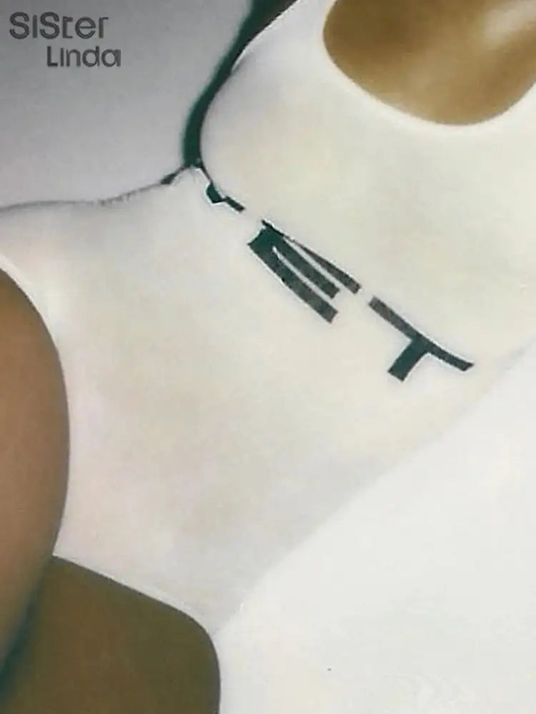 Mono corto informal auténtico para mujer, popular en verano de 2024, con tirantes, escote bajo y espalda descubierta, sin mangas, ideal para combinar con pantalones cortos.