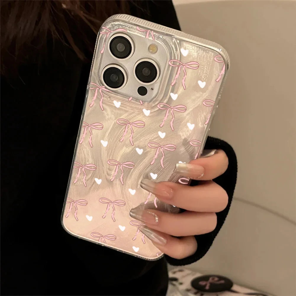 Funda para teléfono con lazo rosa y corazón blanco