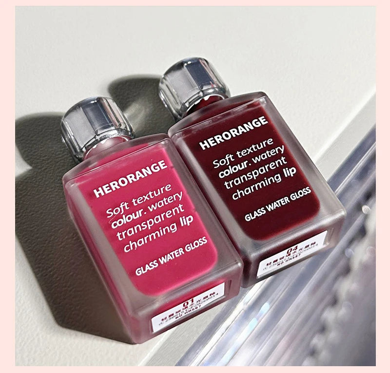 Laca de labios HERORANGE Light Glass-Like: brillo de espejo, fórmula hidratante, resistente a las manchas, de larga duración y que ilumina la piel.