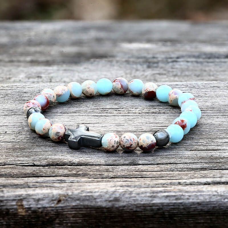 Pulsera de cuentas de piedra natural con cruz magnética negra