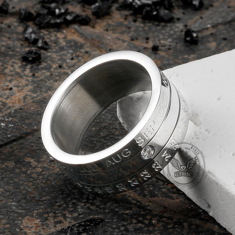 Anillo giratorio de acero inoxidable con diamantes y calendario