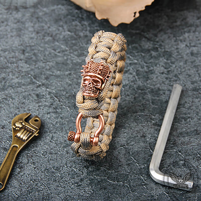 Pulsera de paracord trenzado de latón con cabeza de calavera de camuflaje
