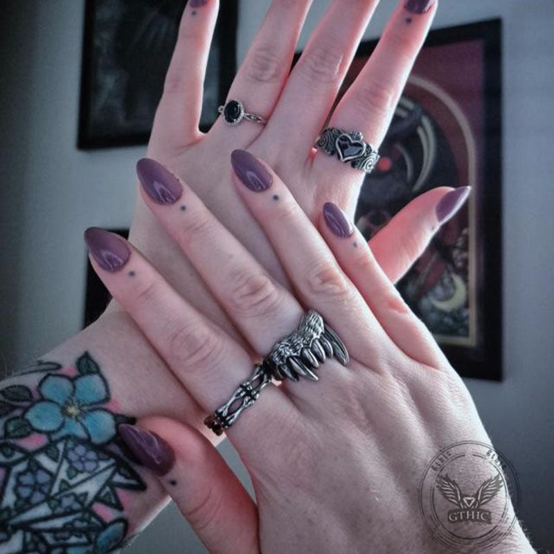 Anillo de acero inoxidable con dientes de vampiro