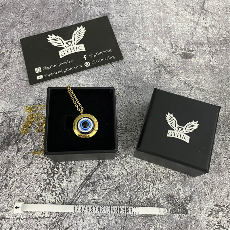 Collar de acero inoxidable con ojo malvado dorado