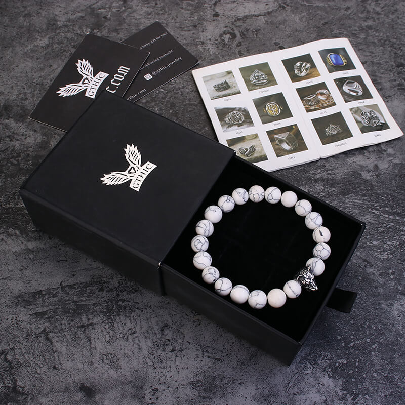 Pulsera de cuentas turquesas de lobo aullador