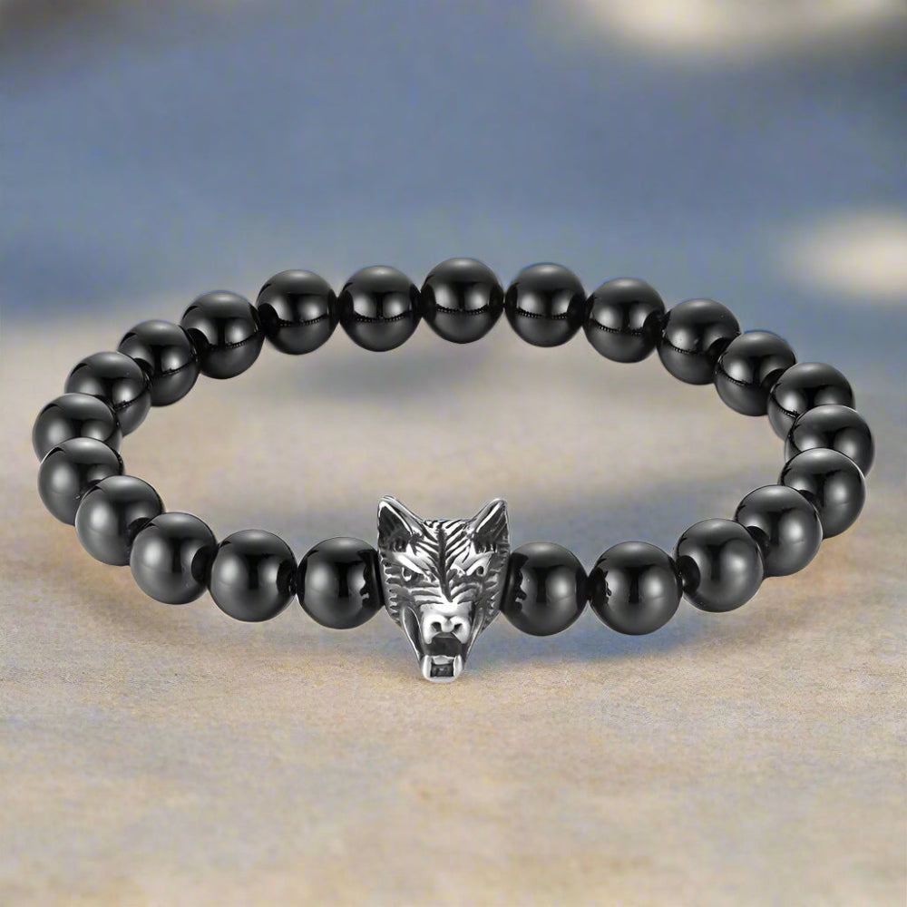 Pulsera de cuentas turquesas de lobo aullador