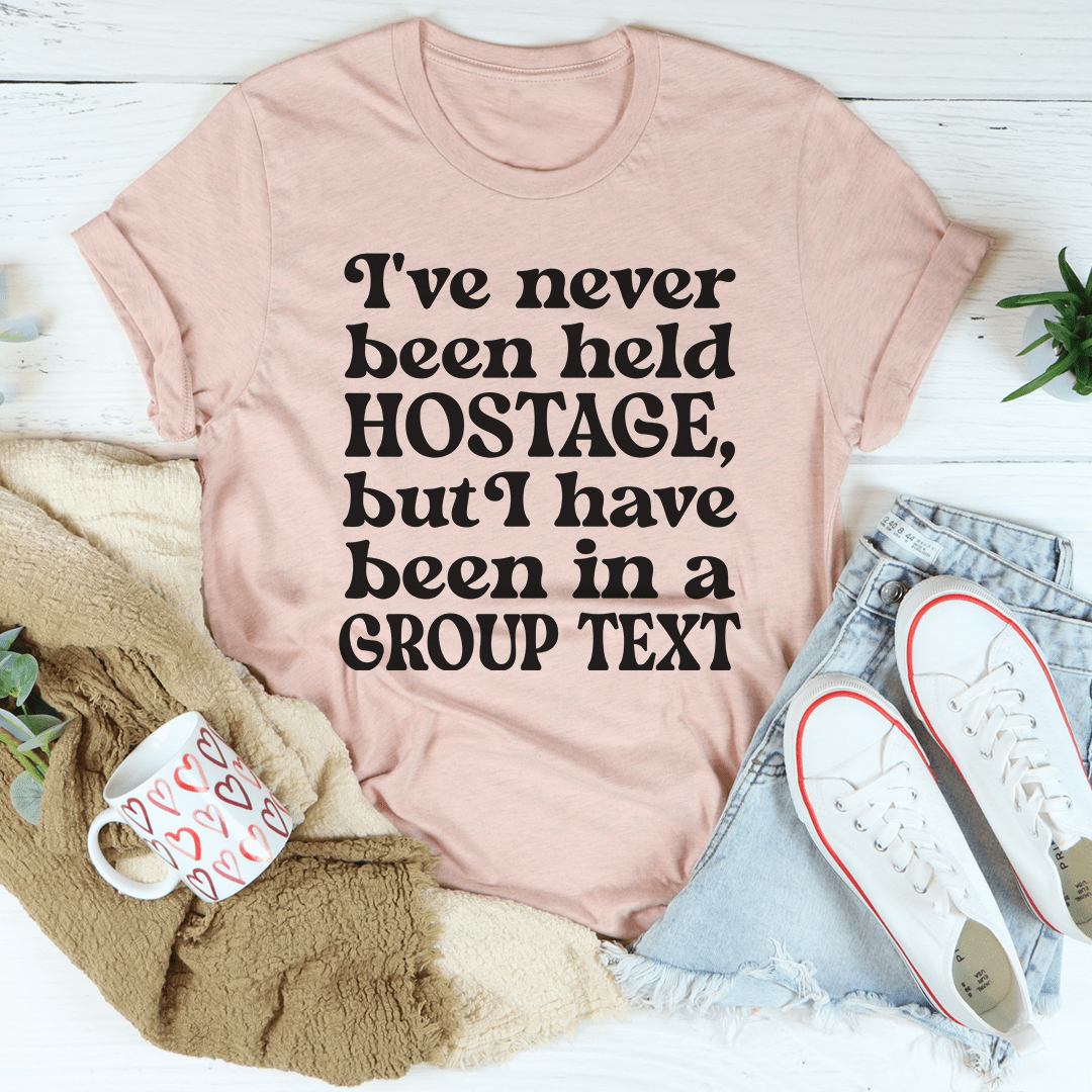 Camiseta con el texto "Nunca me han tomado como rehén, pero sí he estado en un grupo"