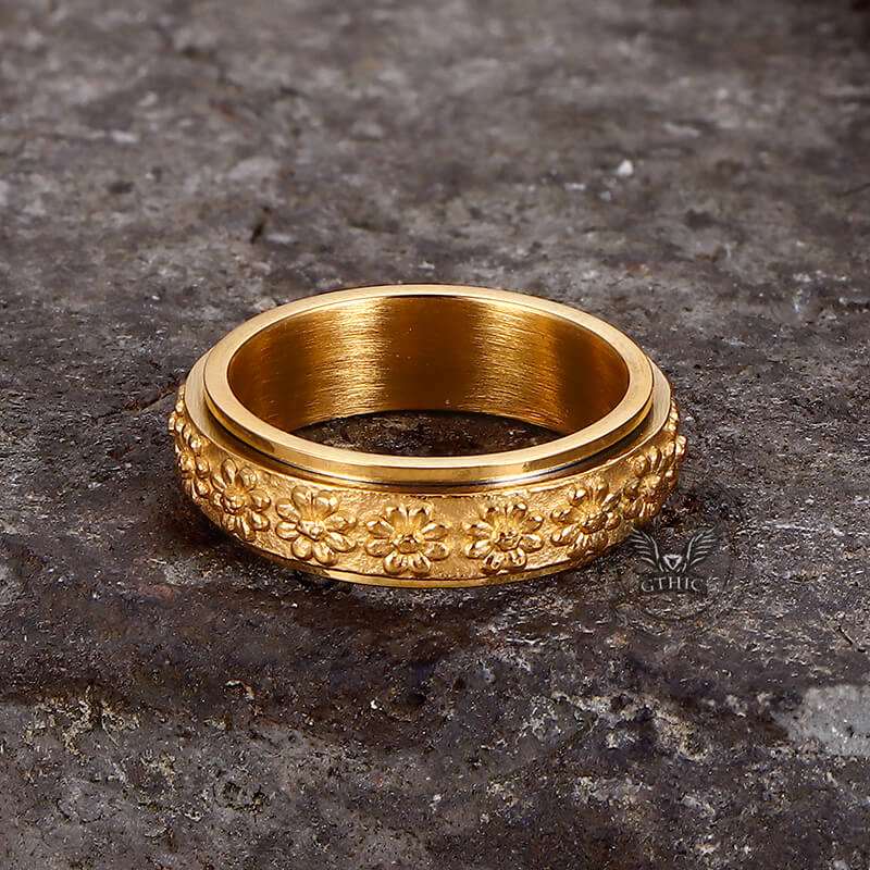 Anillo giratorio de acero inoxidable con diseño de margaritas sencillas