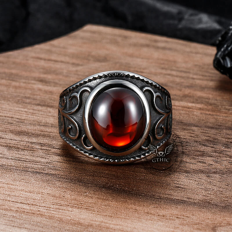 Anillo vintage de acero inoxidable con rubí y flores grabadas