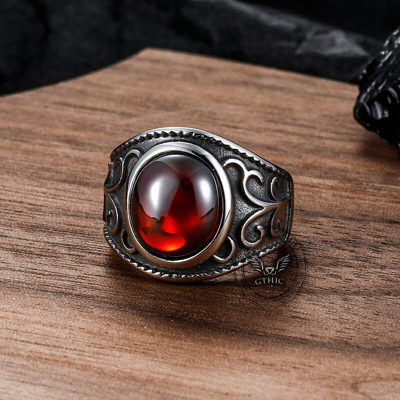 Anillo vintage de acero inoxidable con rubí y flores grabadas