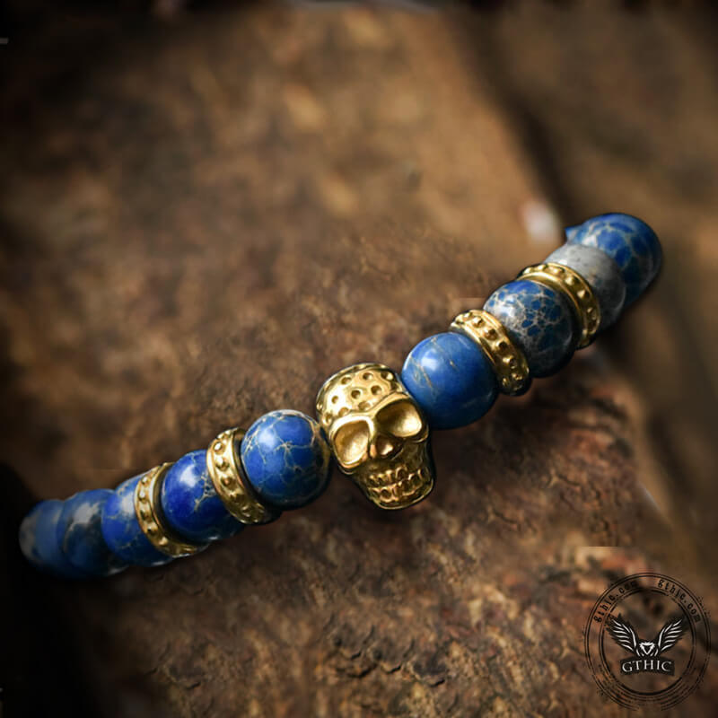 Pulsera de calavera de acero inoxidable con roca volcánica