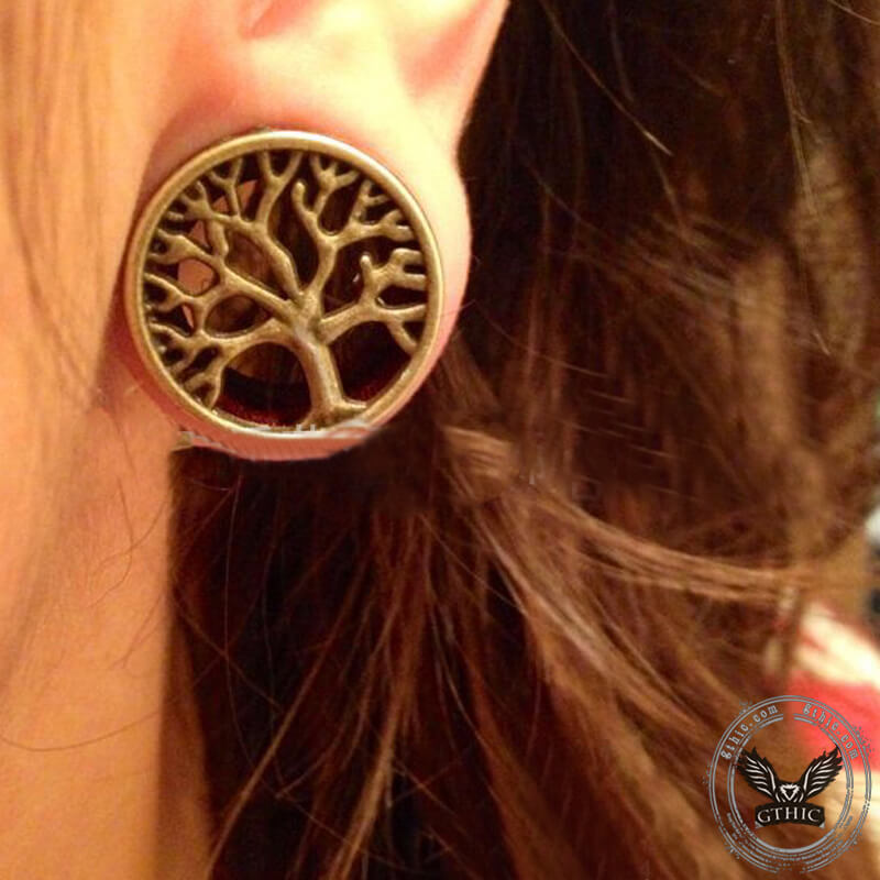 Dilatadores de oreja de latón con forma de árbol de la vida de madera