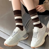 1 par de calcetines térmicos suaves y cómodos a rayas, modernos, informales, versátiles y absorbentes del sudor para deportes al aire libre.