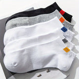 5 pares de calcetines tobilleros lisos para hombre, cómodos, transpirables, suaves y absorbentes del sudor, ideales para exteriores.