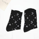 2 pares de calcetines con estampado de estrellas y lunas, cómodos y transpirables, medias de tubo medio para mujer.