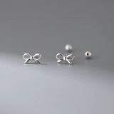 Fashion Hollowed-out Bowknot Thread Stud Earrings - Lootquake