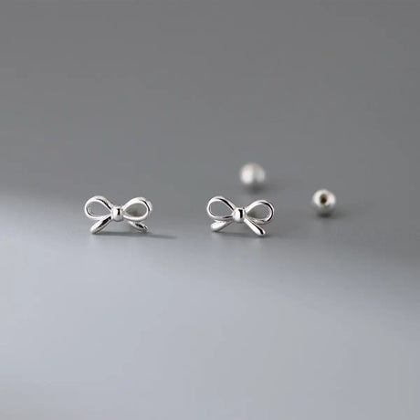Fashion Hollowed-out Bowknot Thread Stud Earrings - Lootquake