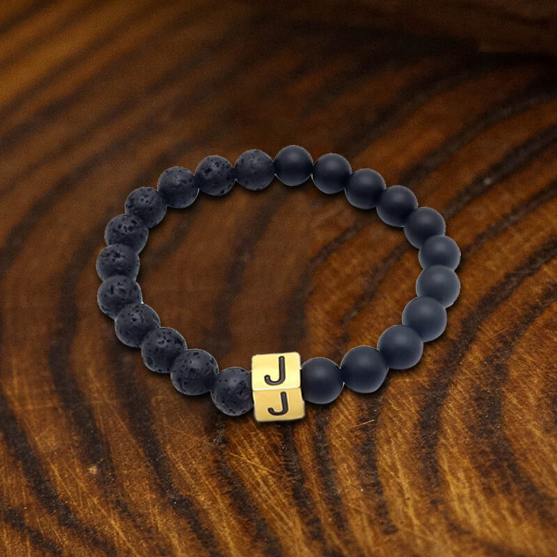 Pulsera de acero inoxidable con 26 cuentas del alfabeto inglés