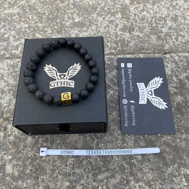 Pulsera de acero inoxidable con 26 cuentas del alfabeto inglés