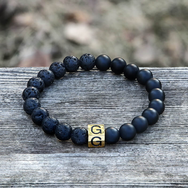 Pulsera de acero inoxidable con 26 cuentas del alfabeto inglés